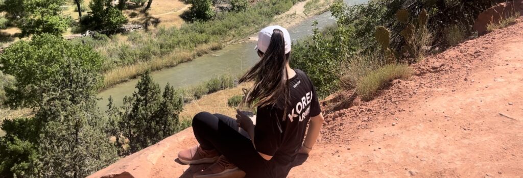 Girl at the Kayenta Trail at Zion National Park