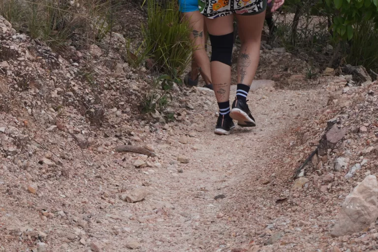 Girl walking on rose quartz trail