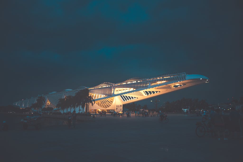 Stunning nighttime view of the Museum of Tomorrow in Rio de Janeiro highlighting its modern architecture.